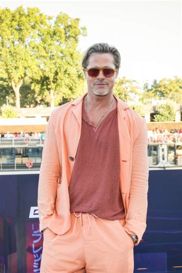
Brad Pitt Rocks An All-Orange Ensemble For ‘Bullet Train’ Photo Call In Paris 